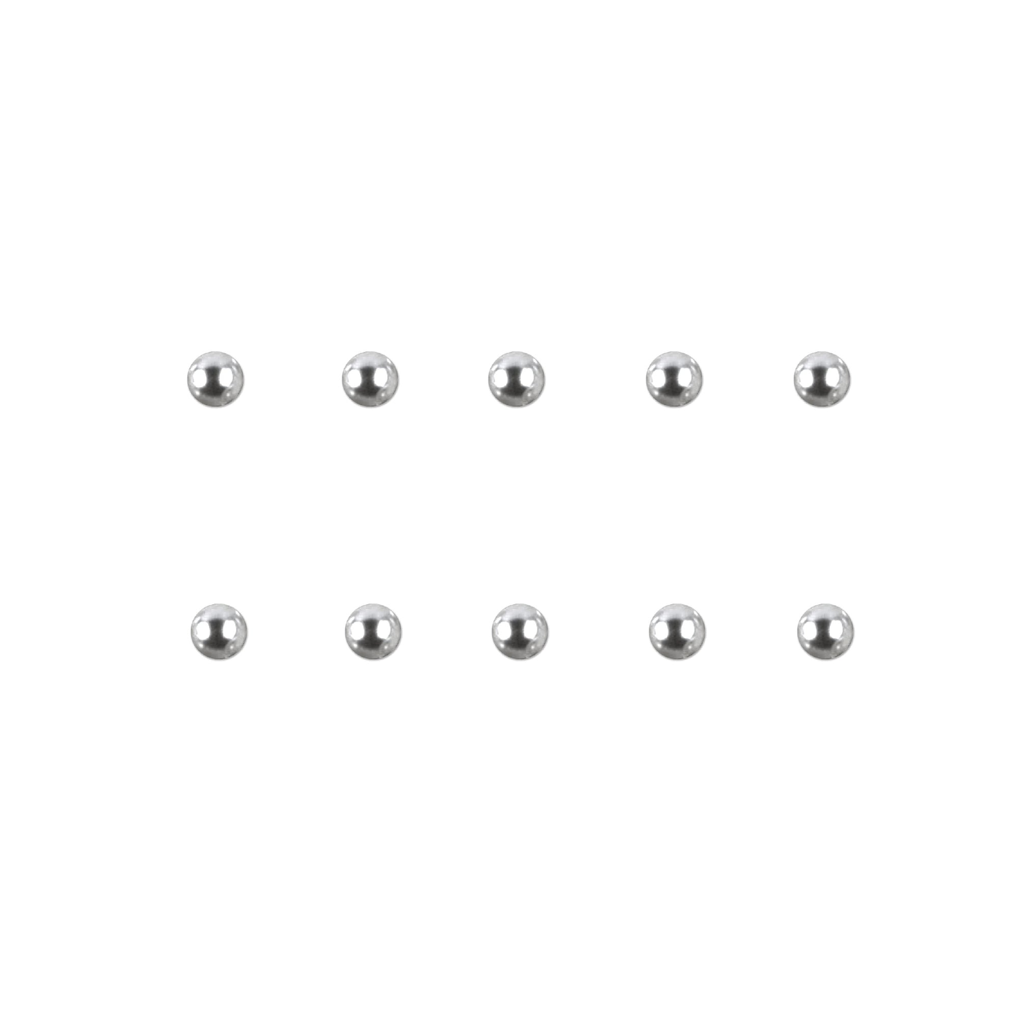 Set of silver chrome nail charms on a white background