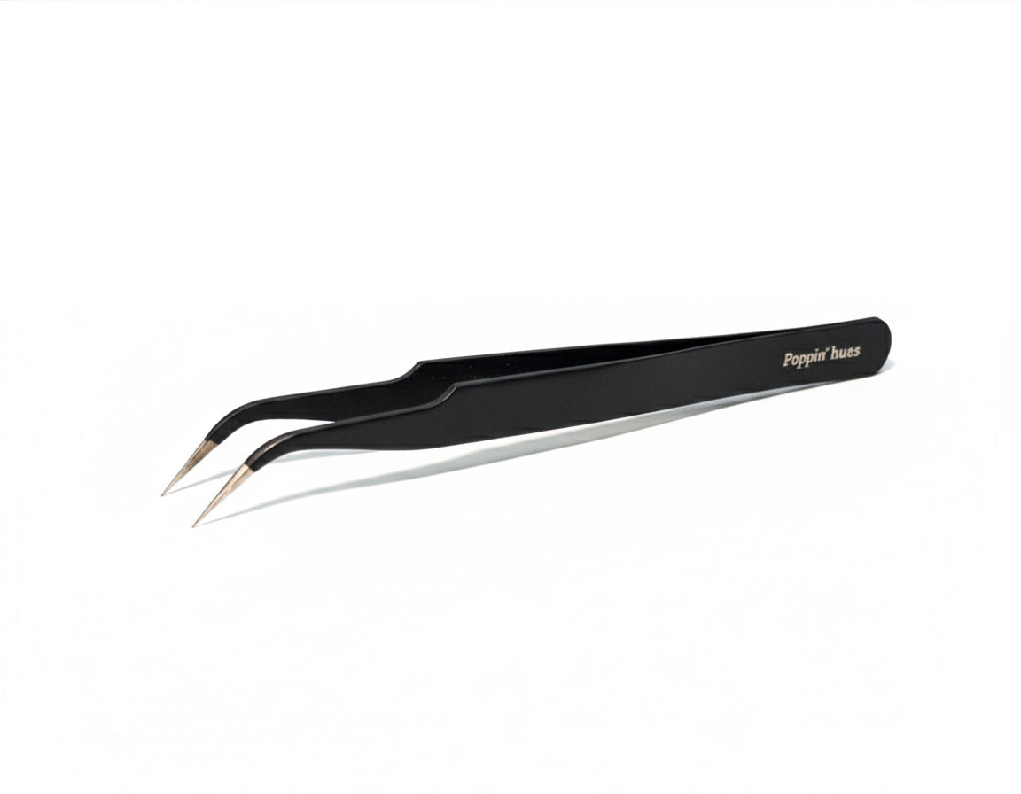 Black tweezers with metal tips on a white background